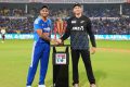 India and New Zealand captains pose with the T20I series trophy