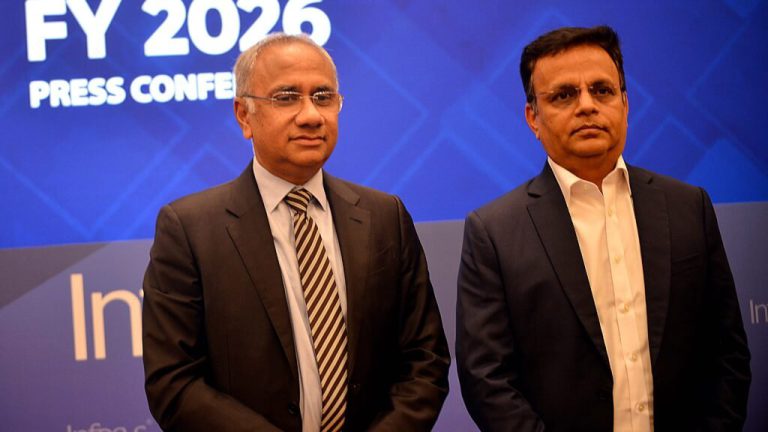 Infosys executive at a previous company results press conference