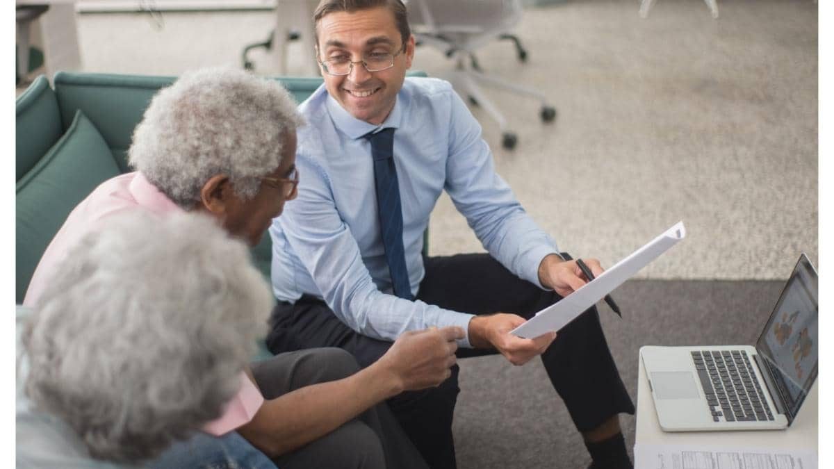 Person researching insurance policies and financial services online