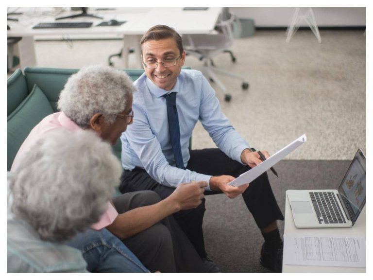Person researching insurance policies and financial services online